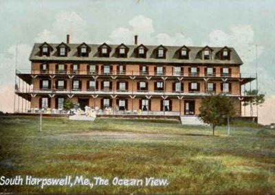 This was the biggest of the Hotels,built in 1884 first called Lawson’s Hotel . In 1901 it was bought by George Cambell who also owned the Merriconeag Hotel at the point 1901-1905. During it’s declining years one attempt at survival was to build a big swimming pool to attract guests. The foundation of this pool is still visible in the back yard of Mr. & Mrs. Ed Burkes’ house. The hotel burned in 1927 a mysterious 3 A.M. firm and story has it that the flames were so high the glow could be seen all the way to Brunswick. It burned so fast that the fire dept. could not save a thing and it was so hot that the cast iron tubs from the bathrooms three floors high actually stacked inside each other when the wooden floors gave way. Other owners were A.S. Young 1905-1911, Harry Lightfoot 1914, and Mrs. Lena Perry 1926 when it burned.